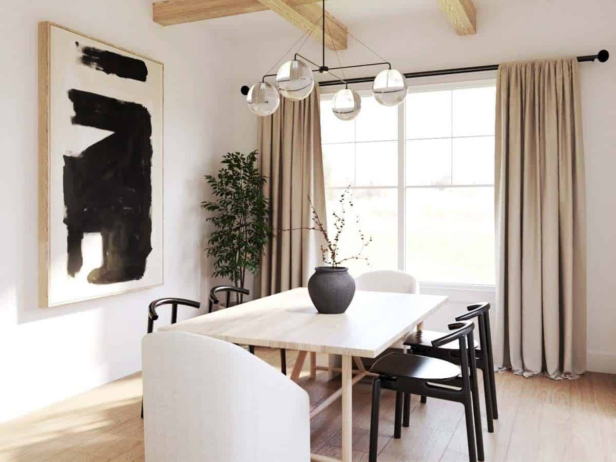 Dining room with a light wood dining table, round-back chairs, and a glass-globe chandelier that hangs from the beamed ceiling.