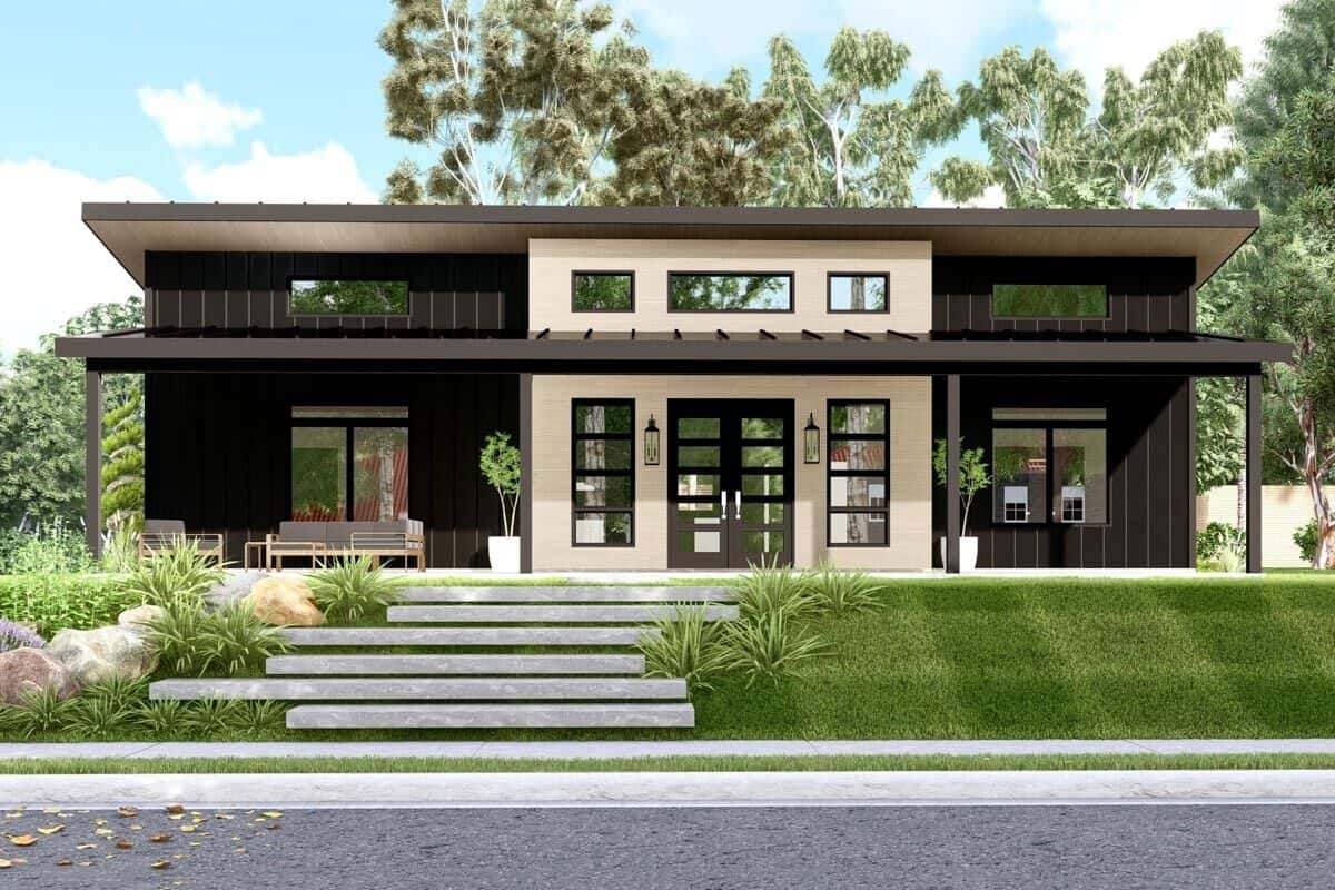 Front view of the house showcasing its expansive front porch with a French entry door and clerestory windows.