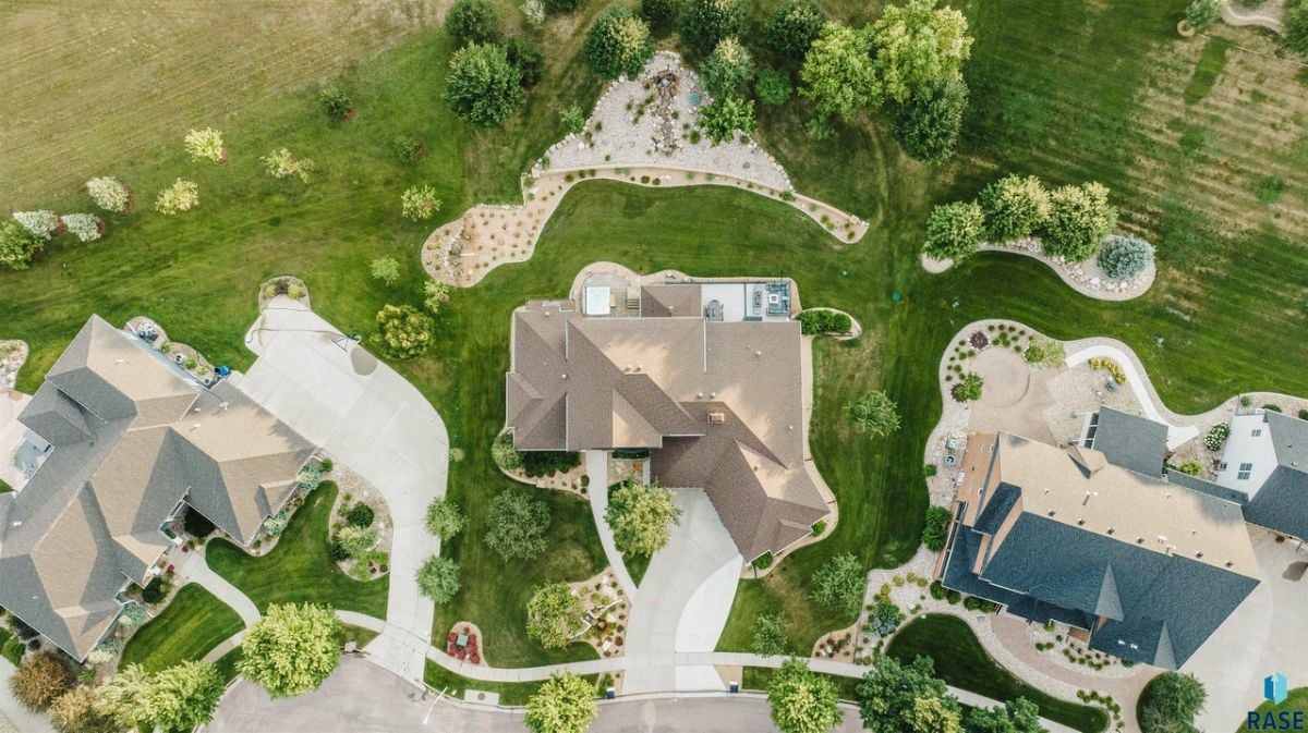 Aerial view of the house and nearby residences.