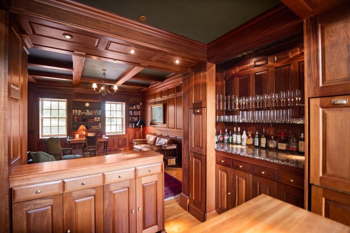 Bar with custom cabinets and custom lights.
