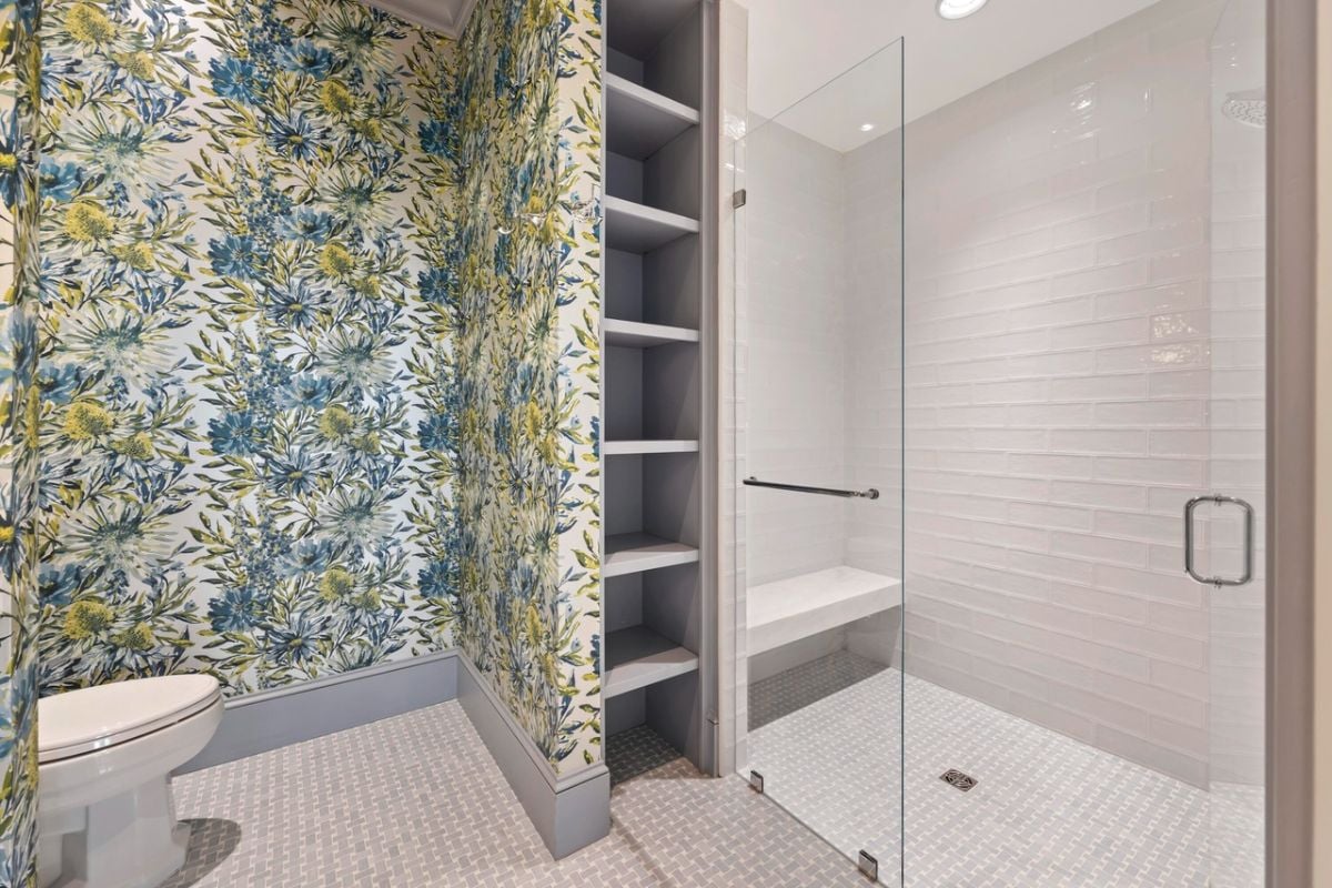 Bathroom with a toilet and a walk-in shower.