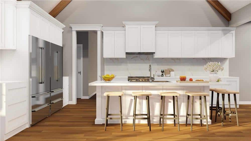 Kitchen with white cabinetry, stainless steel appliances, and a center island paired with wooden bar stools.