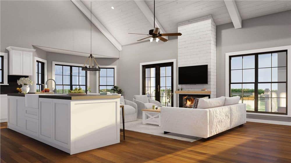A vaulted ceiling accentuated with exposed beams crowned the great room.