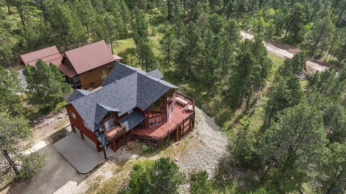 Aerial view surrounded by trees.