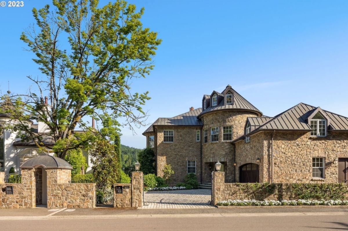 Front view of the house with spacious driveway.