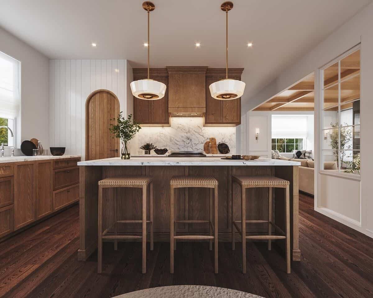 Kitchen with a center island and wooden cabinet that blend in with the hardwood flooring.