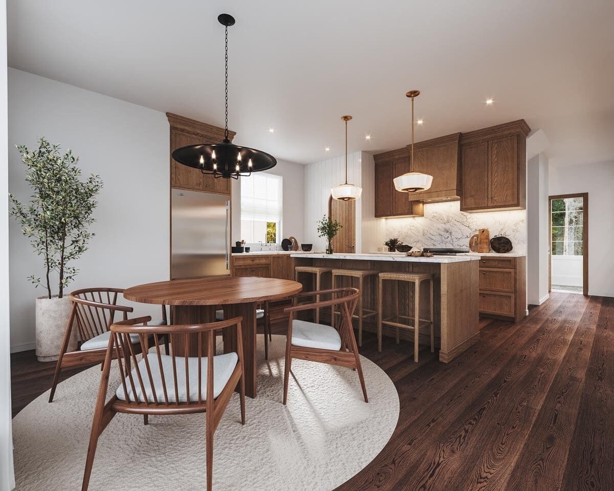 Dining area with a round dining set over a beige area rug.