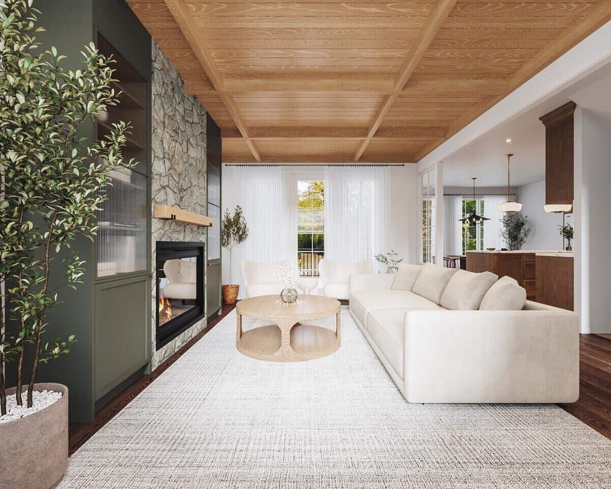 A large opening connects the living room to the eat-in kitchen.