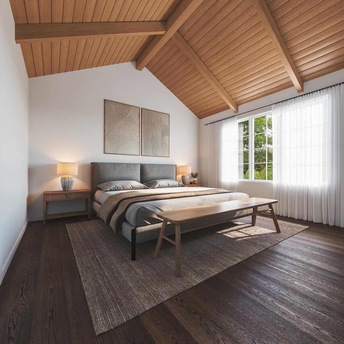 Primary bedroom with wooden nightstands and an upholstered bed complemented with a wooden bench.