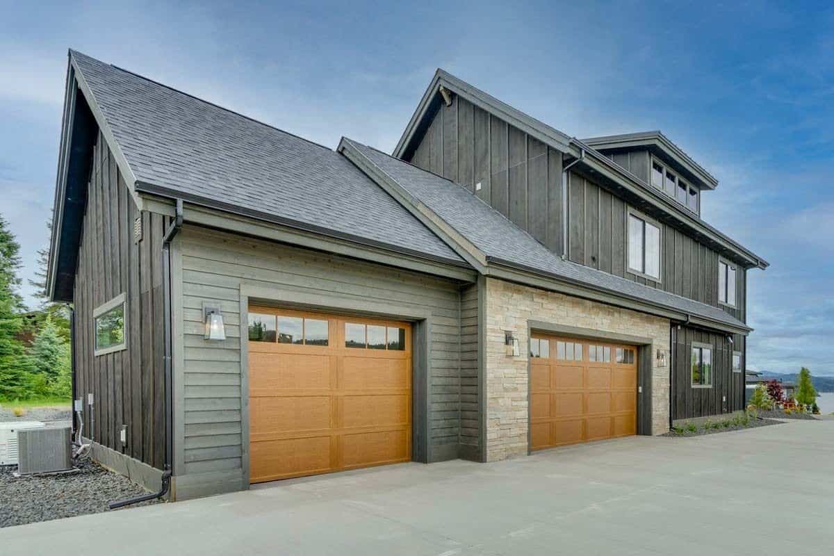 Left view of the house showcasing the 3-car garage.
