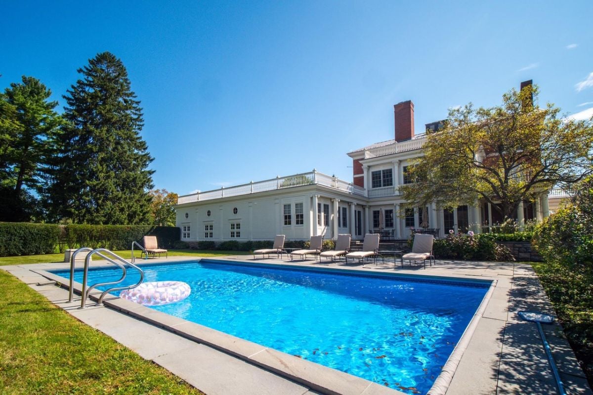 Pool with lounge chairs.
