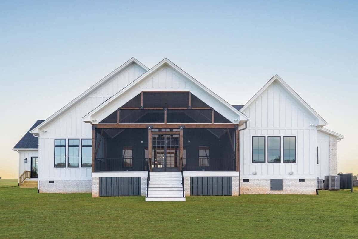 Rear view of the house showcasing the elevated screened porch.
