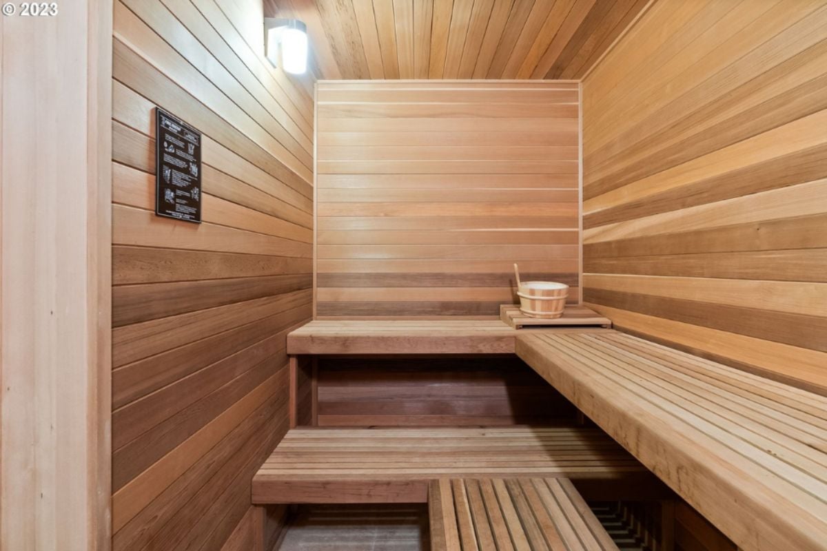 Sauna with wooden walls and benches.