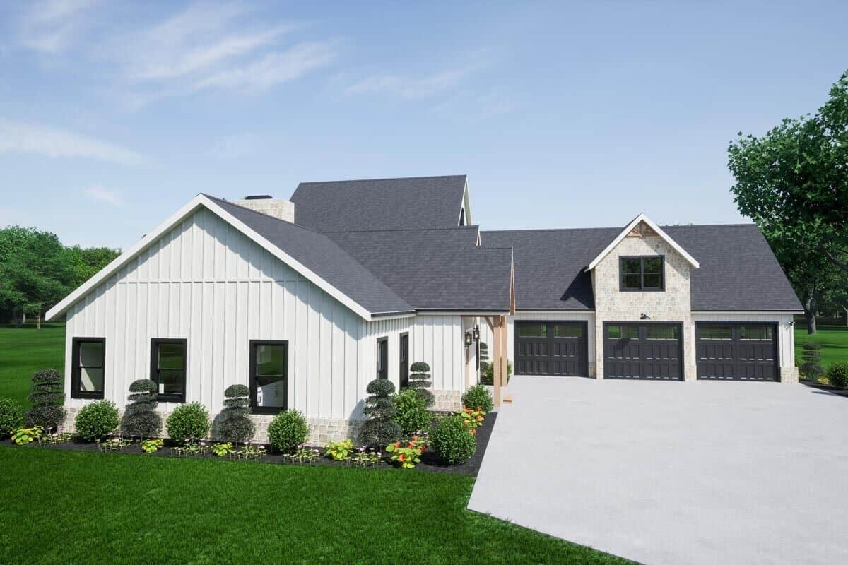 Left view of the house showcasing the 3-car side-loading garage.