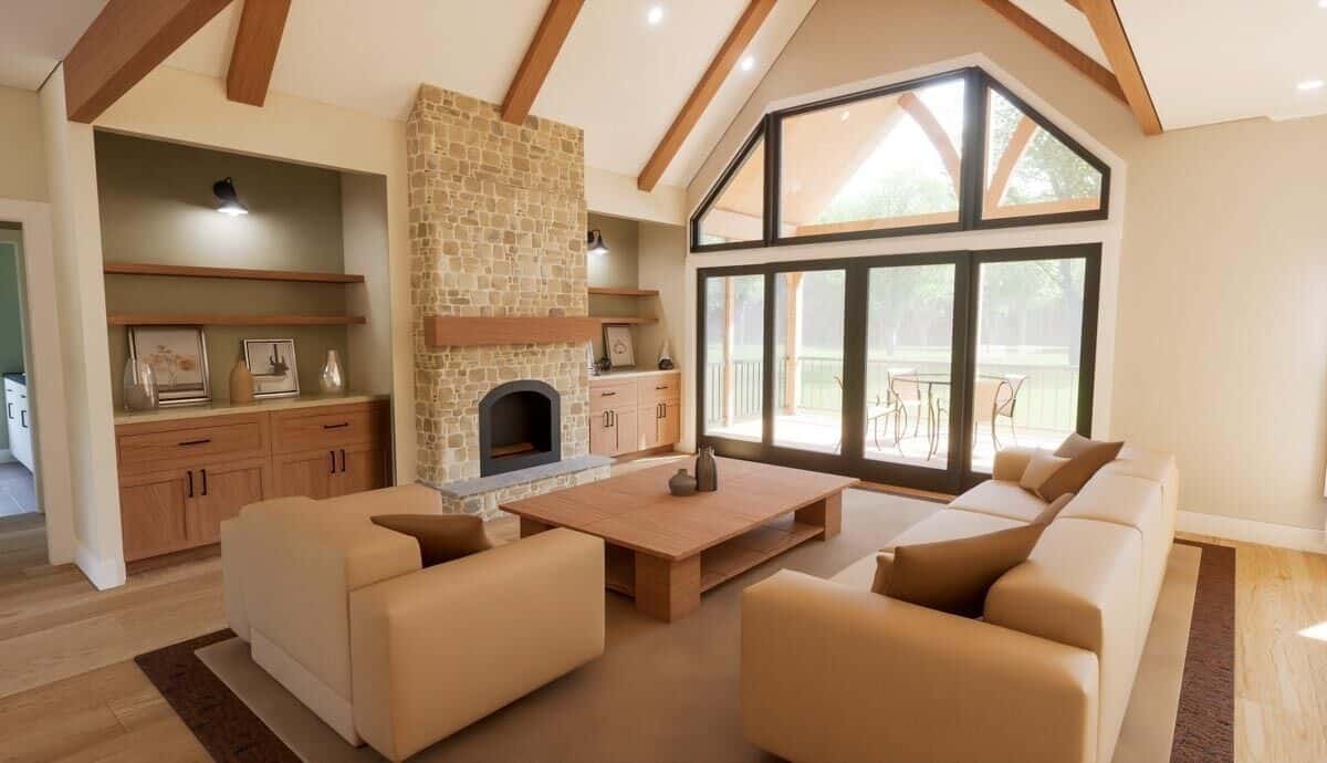 Great room with modern sofas, a stone fireplace, and a vaulted ceiling accentuated by exposed wood beams.