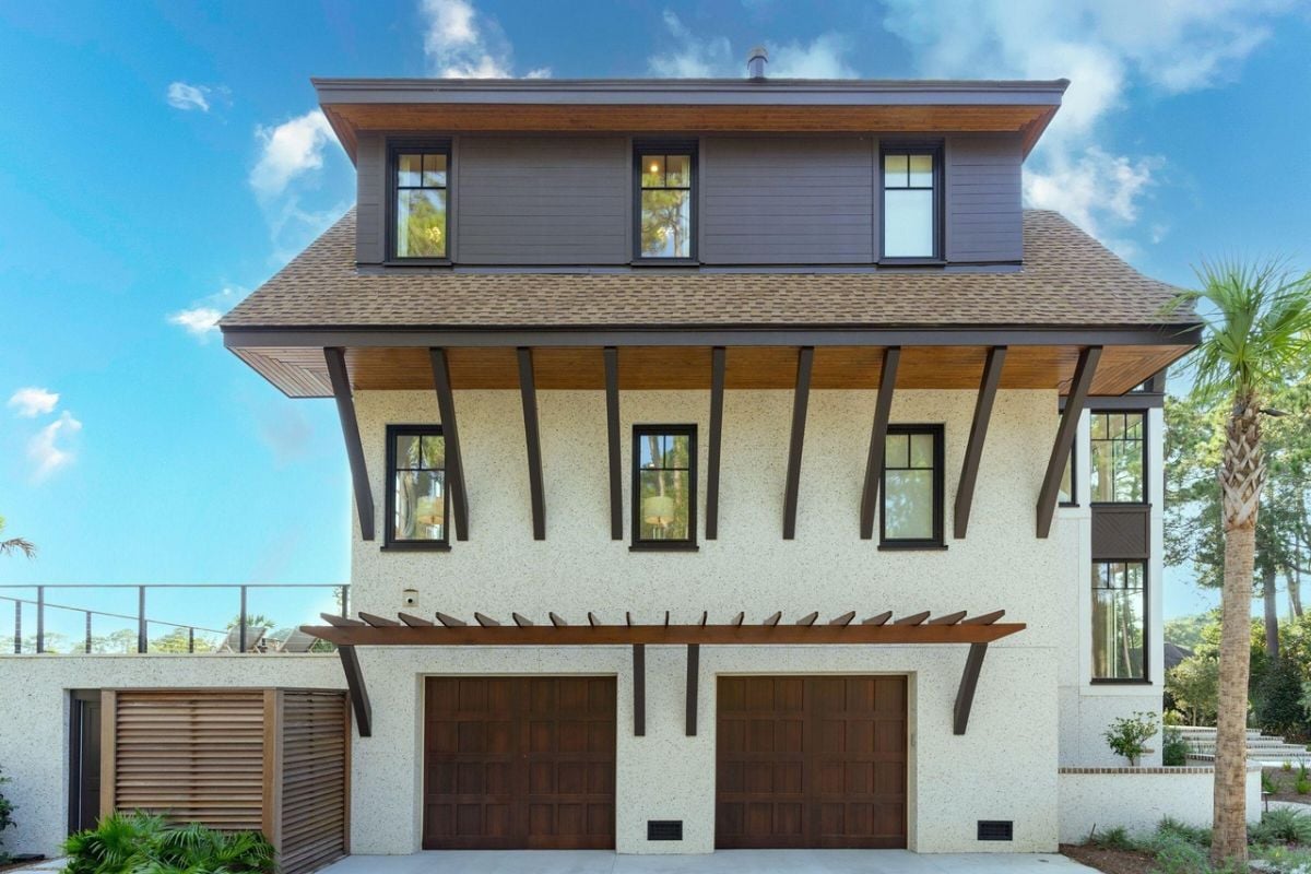Garage with a large driveway.