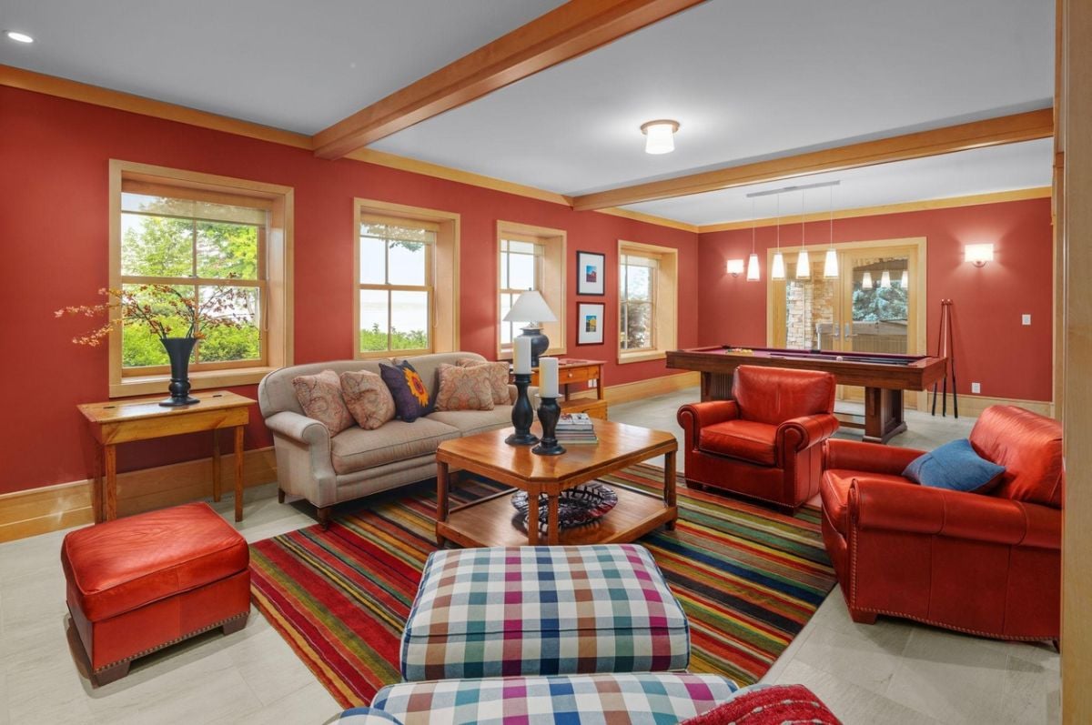 Recreation room with couches and billiards table