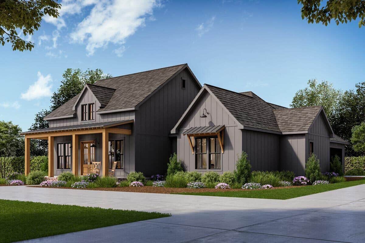 Front-right view with a covered front porch and a side-entry garage complemented with a concrete driveway.