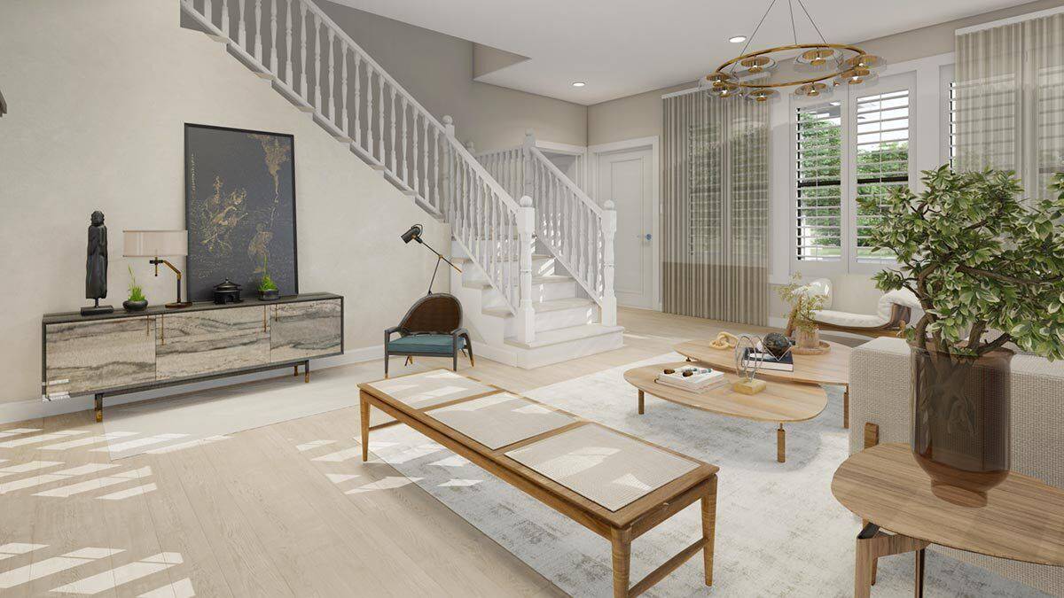 Family room with wooden tables and a hardwood floor topped with a distressed area rug.