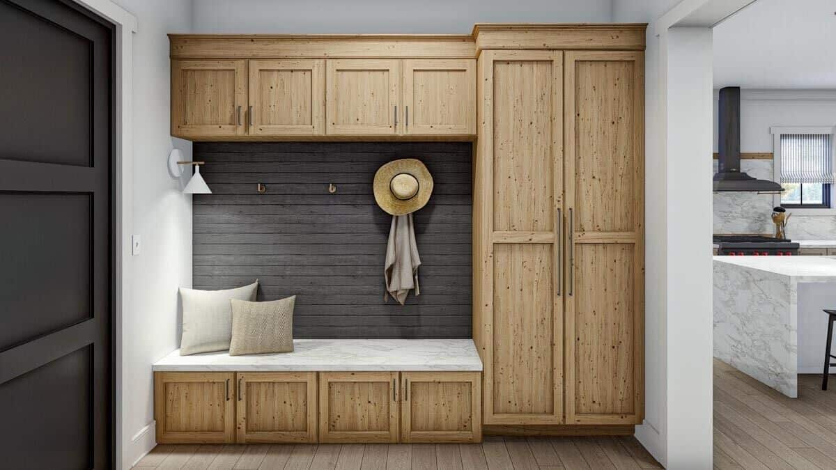 Mudroom with wooden built-ins and a storage bench.