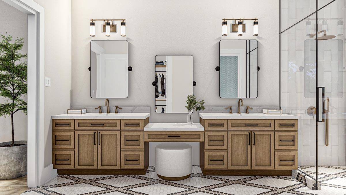 His and her vanities with a makeup counter in the middle.