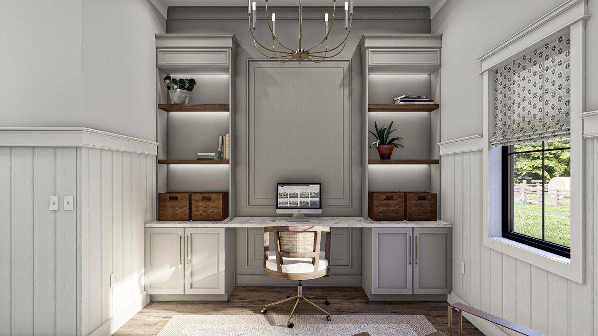 Home office with half beadboard walls and a built-in desk paired with a swivel chair.