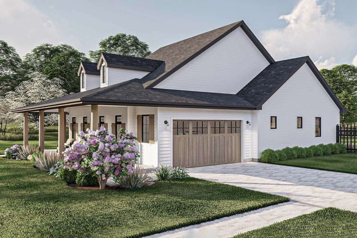 Front-right view with an a covered entry and a side-loading garage.