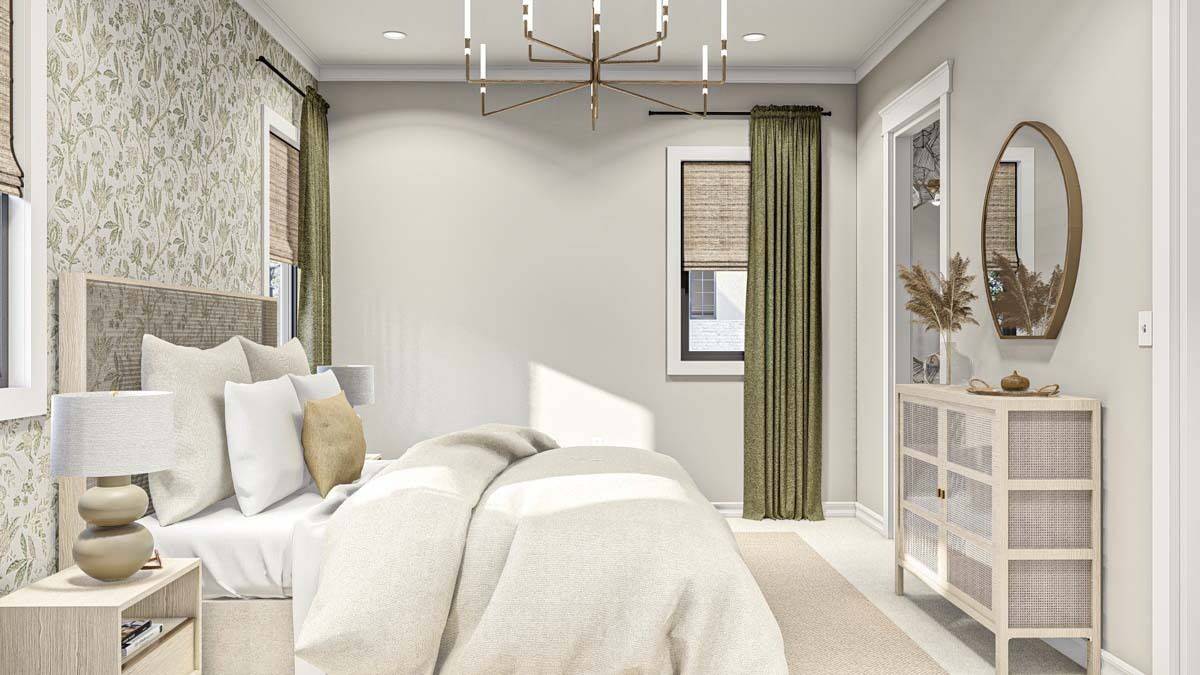 The primary bedroom includes an ensuite bath and a dresser topped with a decorative mirror.