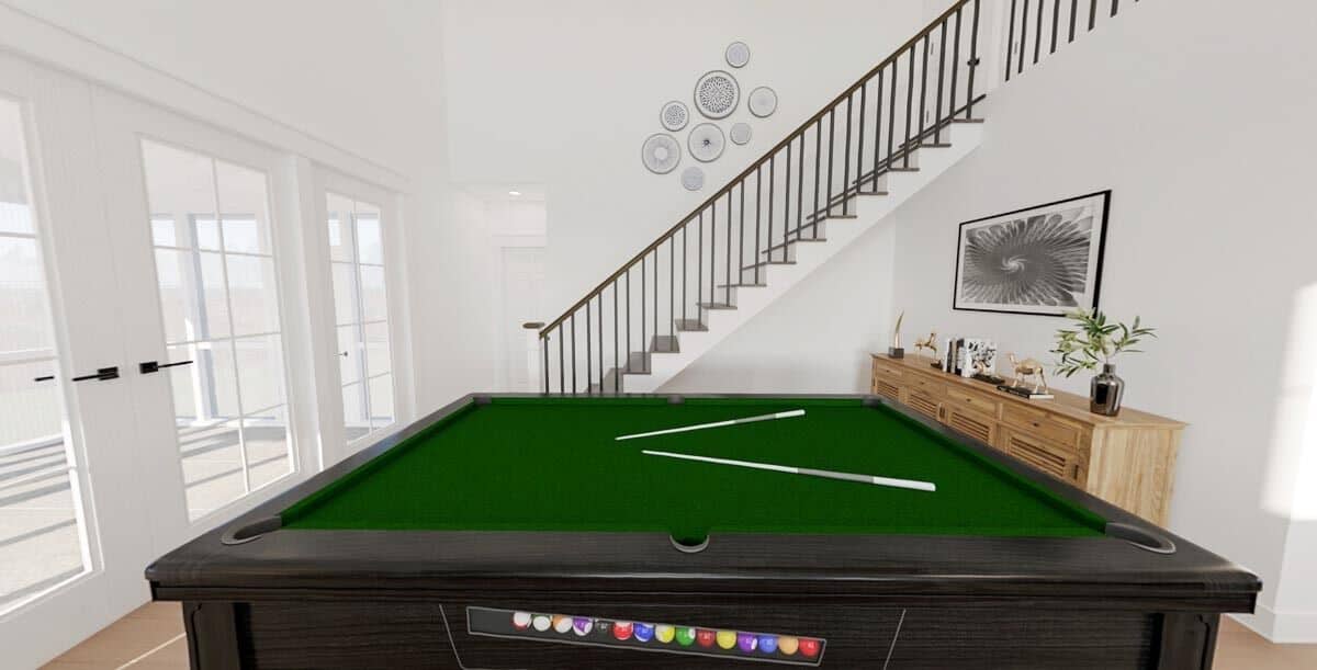 Rec room with a billiards table, a wooden console table, and a staircase leading to the secondary bedrooms.