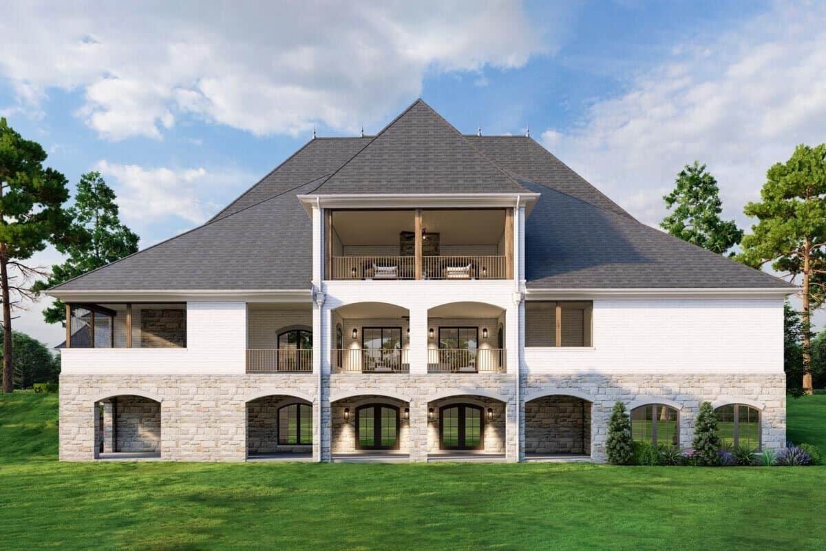 Rear view of the house with stacked porches and a walkout basement.