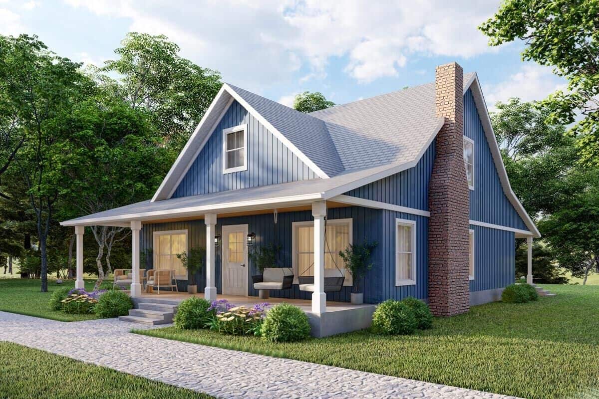 Front-right view with a brick chimney and a covered entry porch framed with decorative columns.