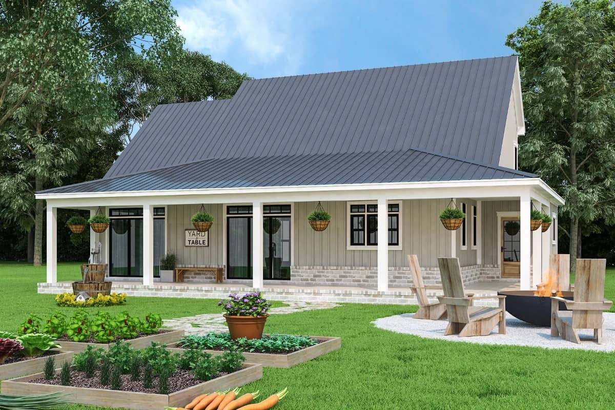 Rear view of the house showcasing the wraparound porch bordered with white columns,