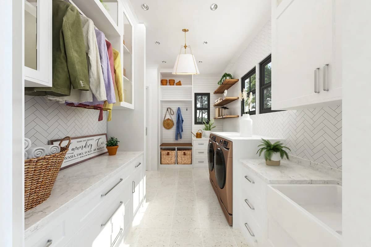 Laundry room with ample storage, marble countertops, and herringbone tiled backsplash.