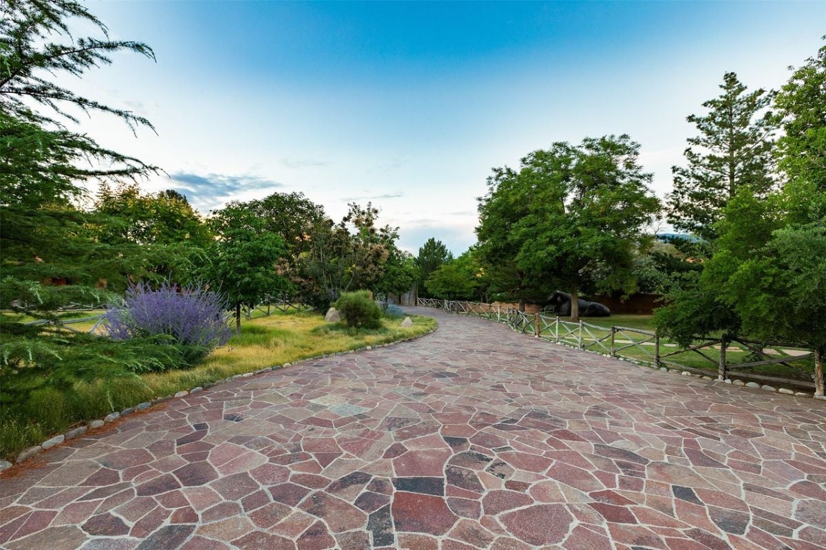 Paver walkway to the mansion