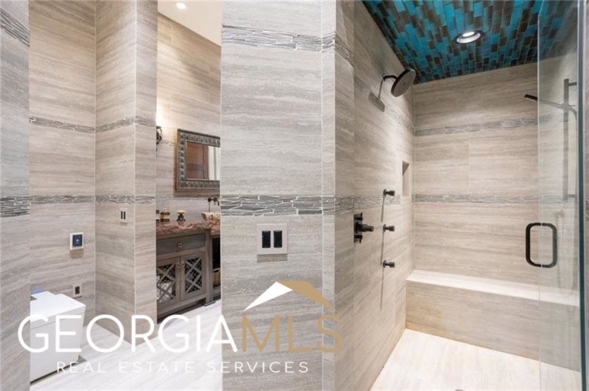 Shower area of the master's suite bathroom.