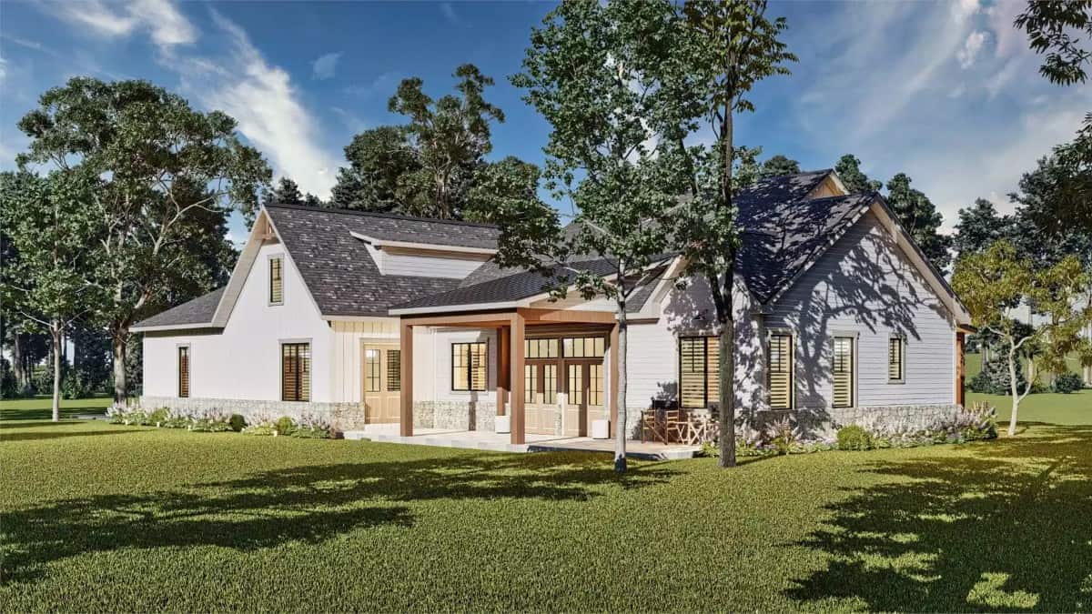Rear-left view of the house showcasing the partially covered patio.