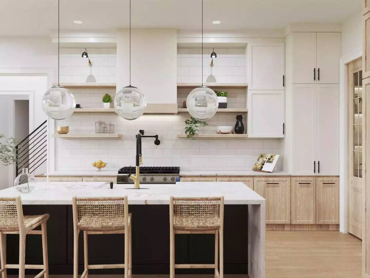 Glass-globe pendants and wicker bar stools complement the kitchen island.