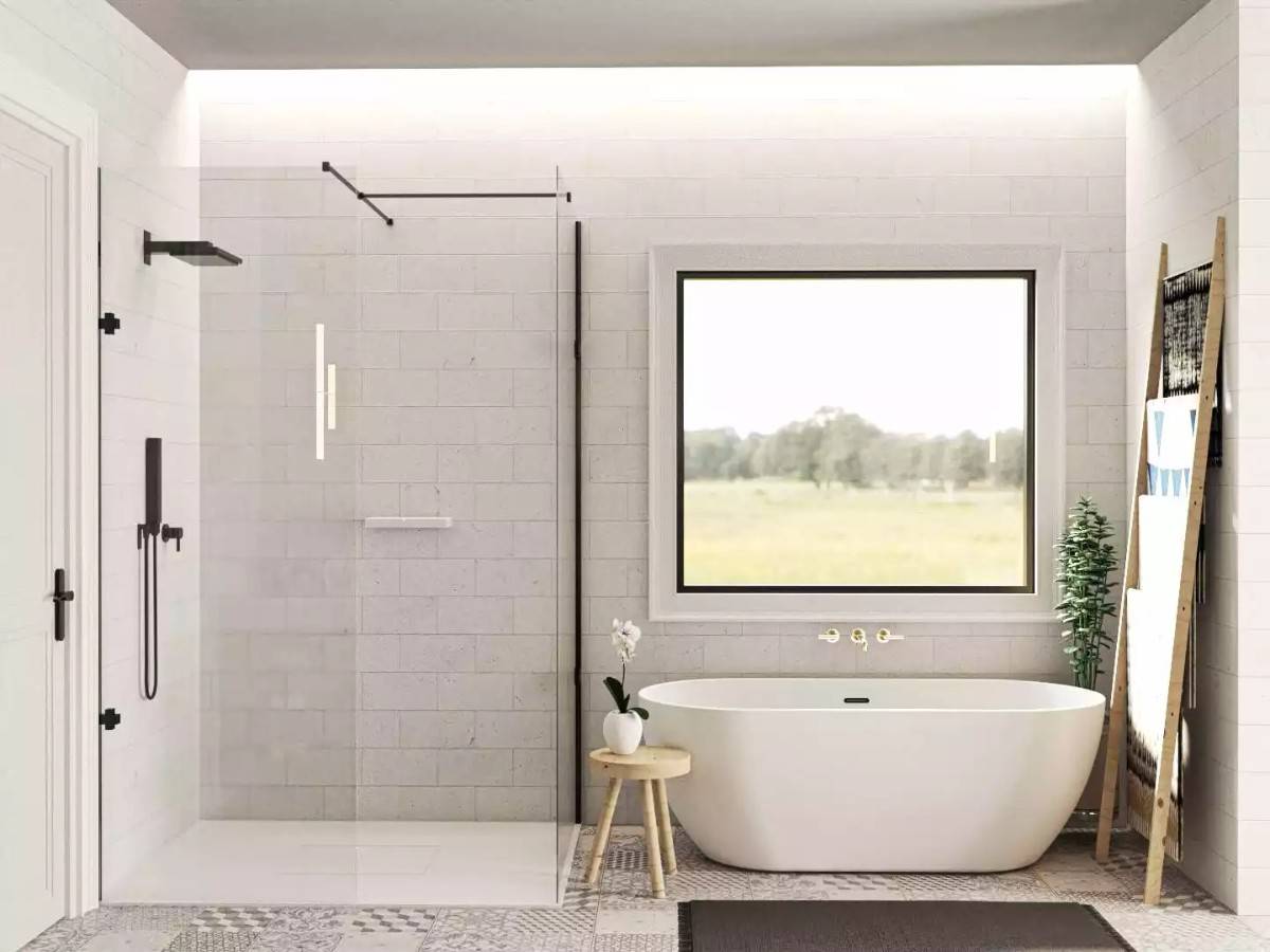 Primary bathroom with a walk-in shower and a freestanding tub under the picture window.