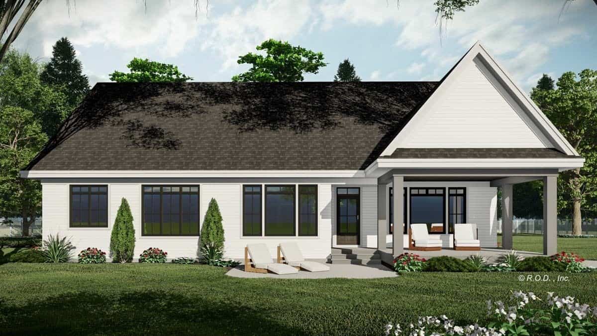 Rear view with a covered porch and an open patio with sun loungers.