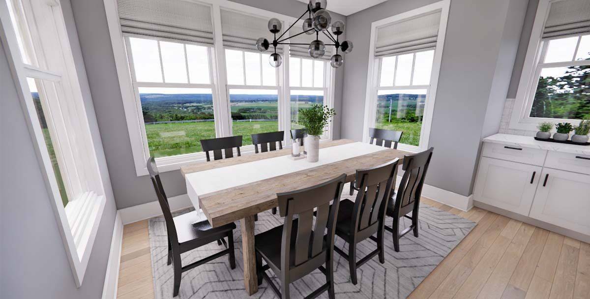 Dining room with an 8-seater dining set and white-framed windows overlooking the lush yard.