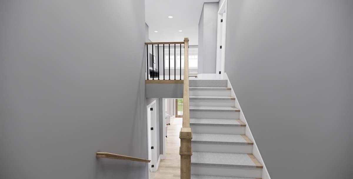 Staircase leading to the secondary bedrooms.