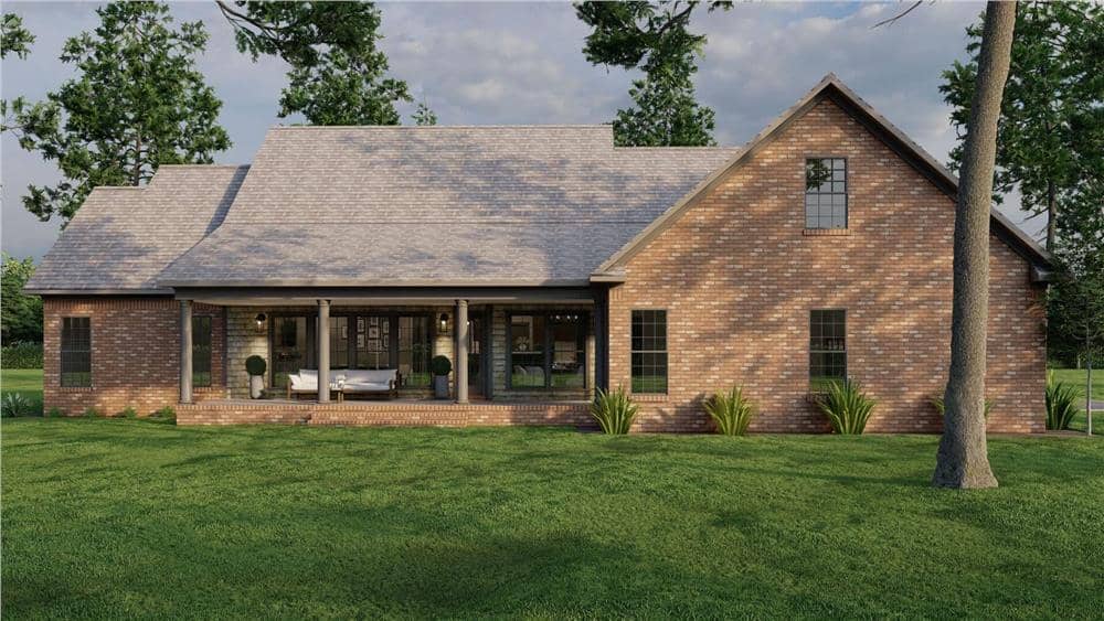 Rear view of the house showcasing the covered patio framed with timber posts.