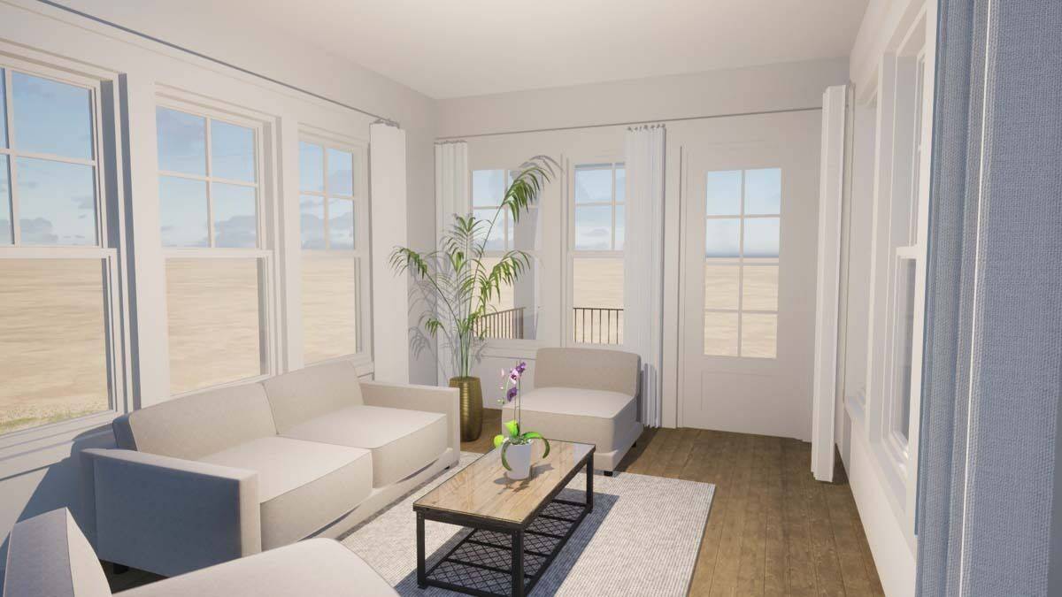 Living room with modern sofas and a metal coffee table over a gray area rug.