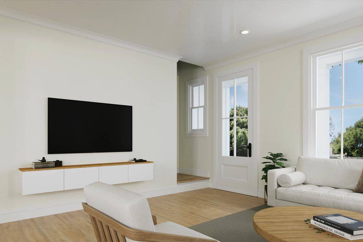 The living room includes a large TV mounted above the floating console table.