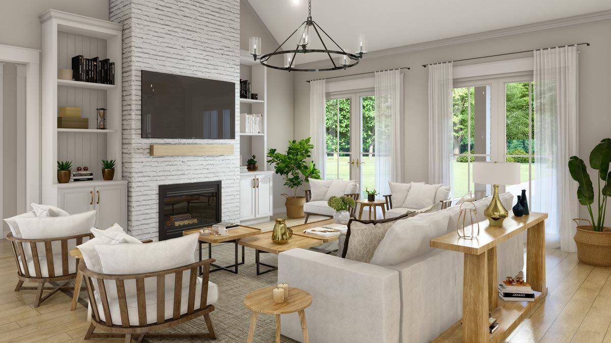 Two sets of French doors extend the great room onto the rear porch.