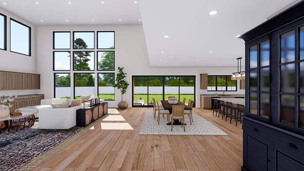 An open layout view of the great room, dining area, and kitchen from the foyer.