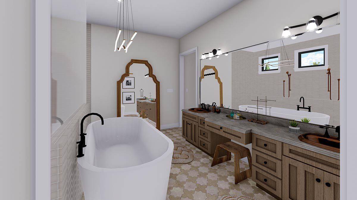 The primary bathroom includes a makeup counter nestled between his and her vanities.