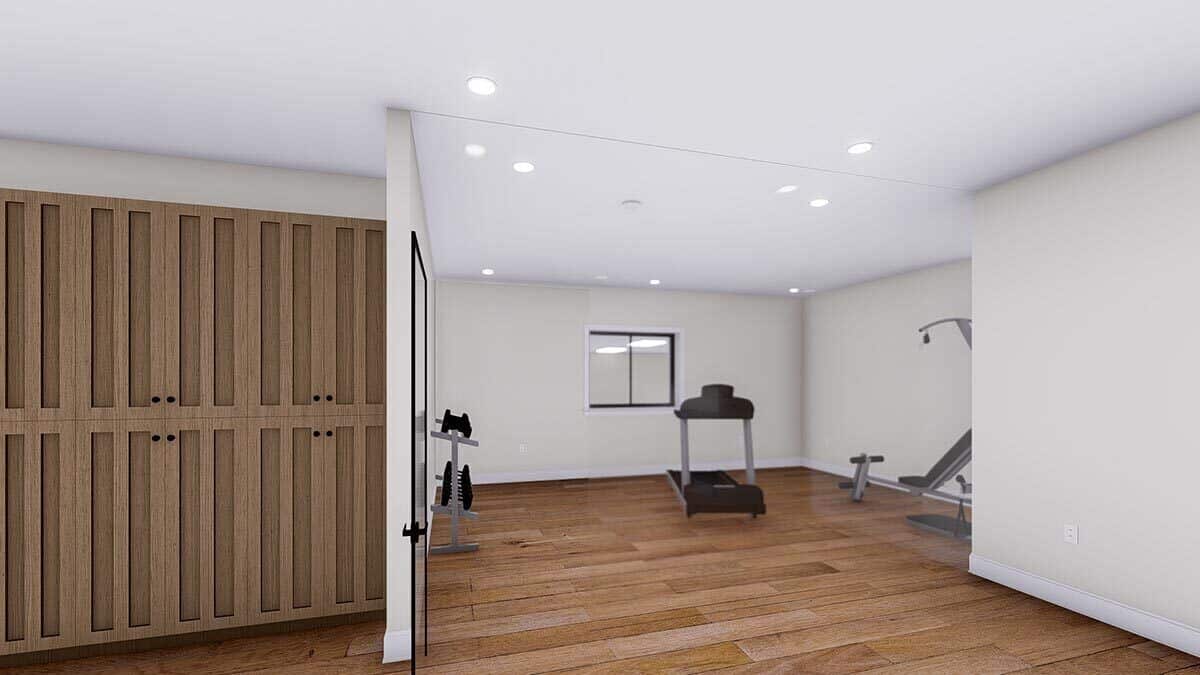 Exercise room with lockers and sliding windows.