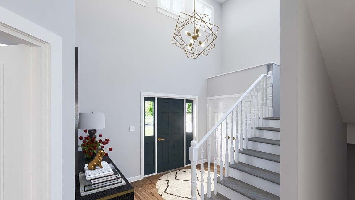 A geometric chandelier illuminates the foyer.