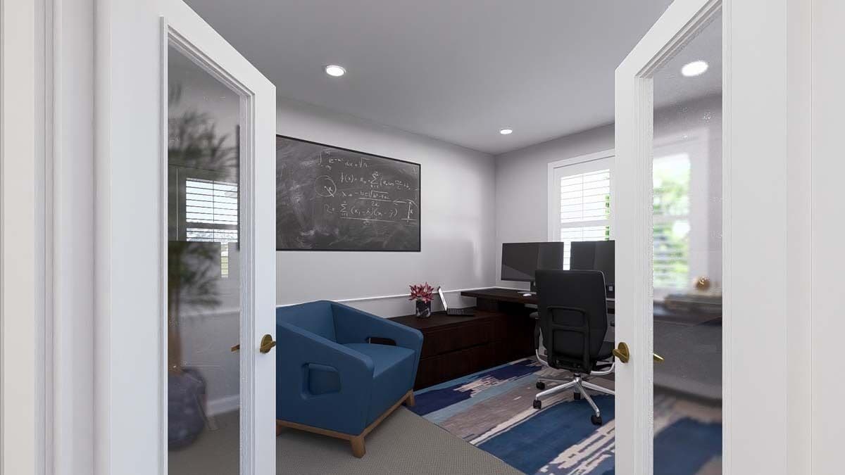 Home office with a French door, a blue chair, and a built-in desk.